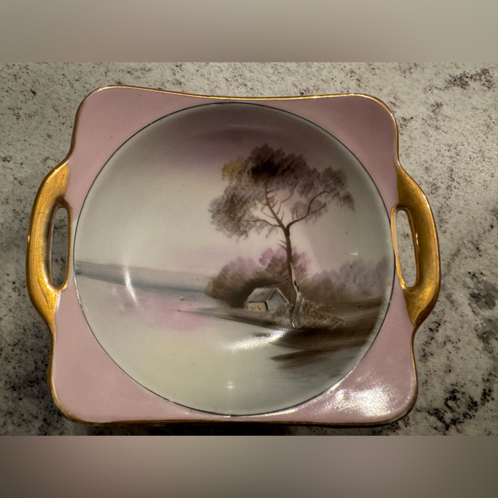 This is a vintage, hand-painted Noritake trinket or serving dish.